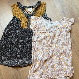 2 sleeveless blouses